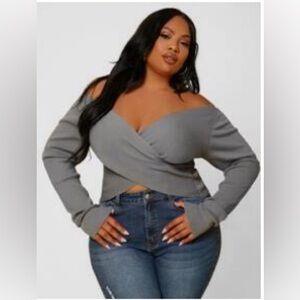 Grey sweater with a twist design